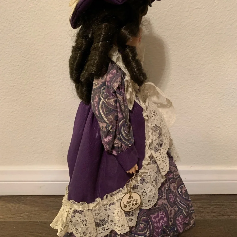 Elegant Purple and Cream Doll
